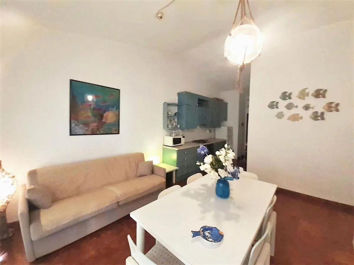 Inviting Holiday Home In Marinella With Shared Garden