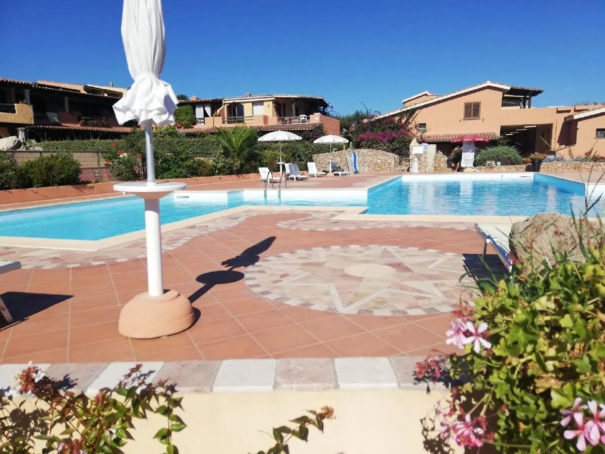 Inviting Holiday Home In Marinella With Shared Garden Italy