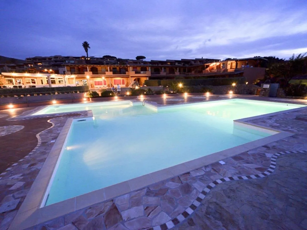 Inviting Holiday Home In Marinella With Shared Garden