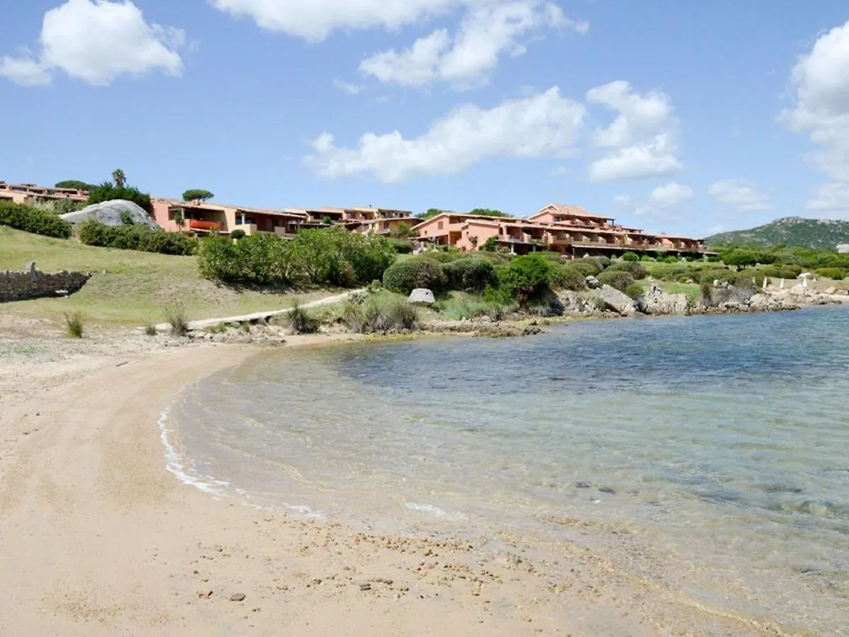 Inviting Holiday Home In Marinella With Shared Garden Italy