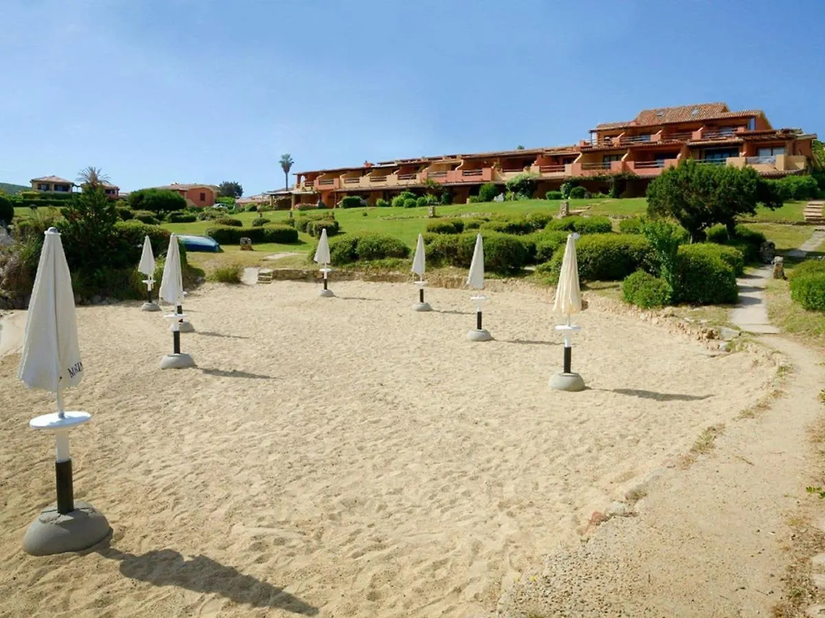 Inviting Holiday Home In Marinella With Shared Garden